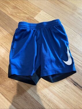 Nike Royal Blue Kids Athletic Shorts with White Swoosh